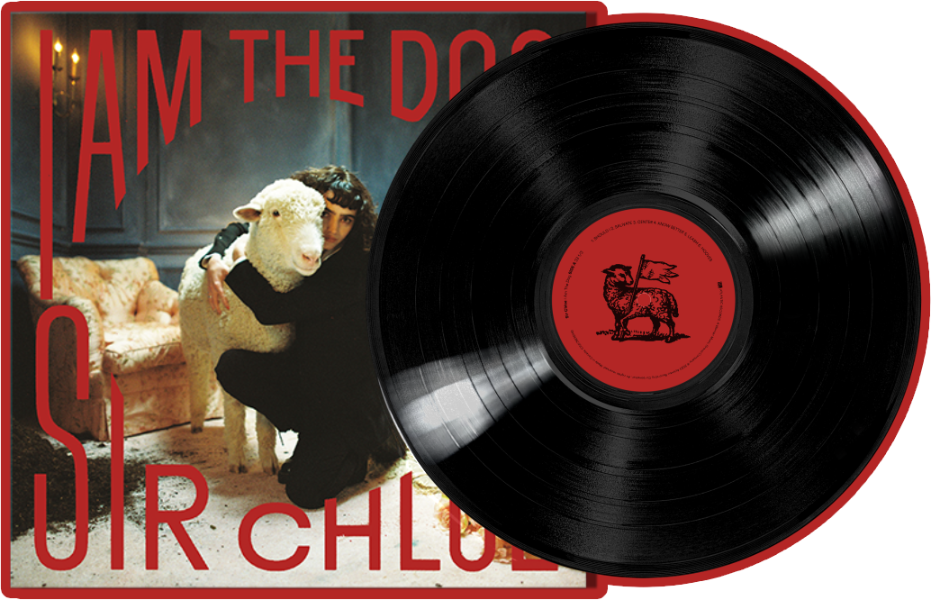 A record disc overlaid over the album 'I Am the Dog.'